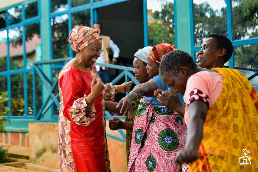 Maggy-being-greeted-at-Mahama-Refugee-Camp