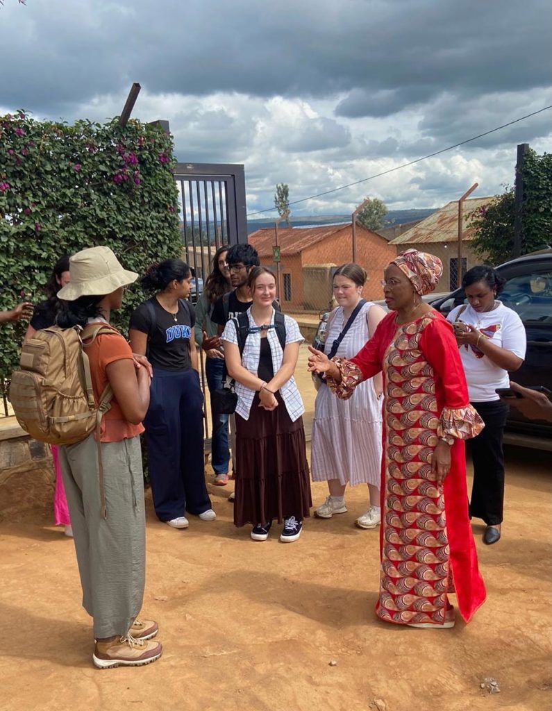 Maggy-welcoming-students-to-Camp-Mahama